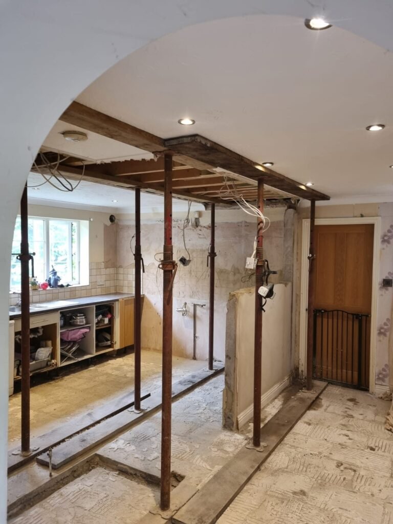 Open-plan family kitchen — before